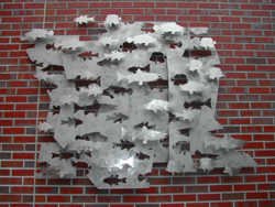 Schooling Fish by Gar Waterman, located at the Aquatic Products Lab